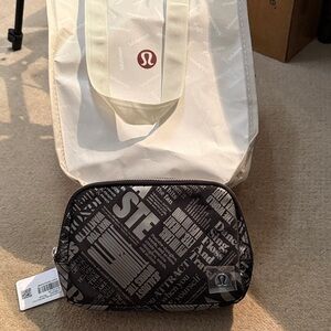 Lululemon Everywhere Belt Bag Manifesto Print Black Pouch